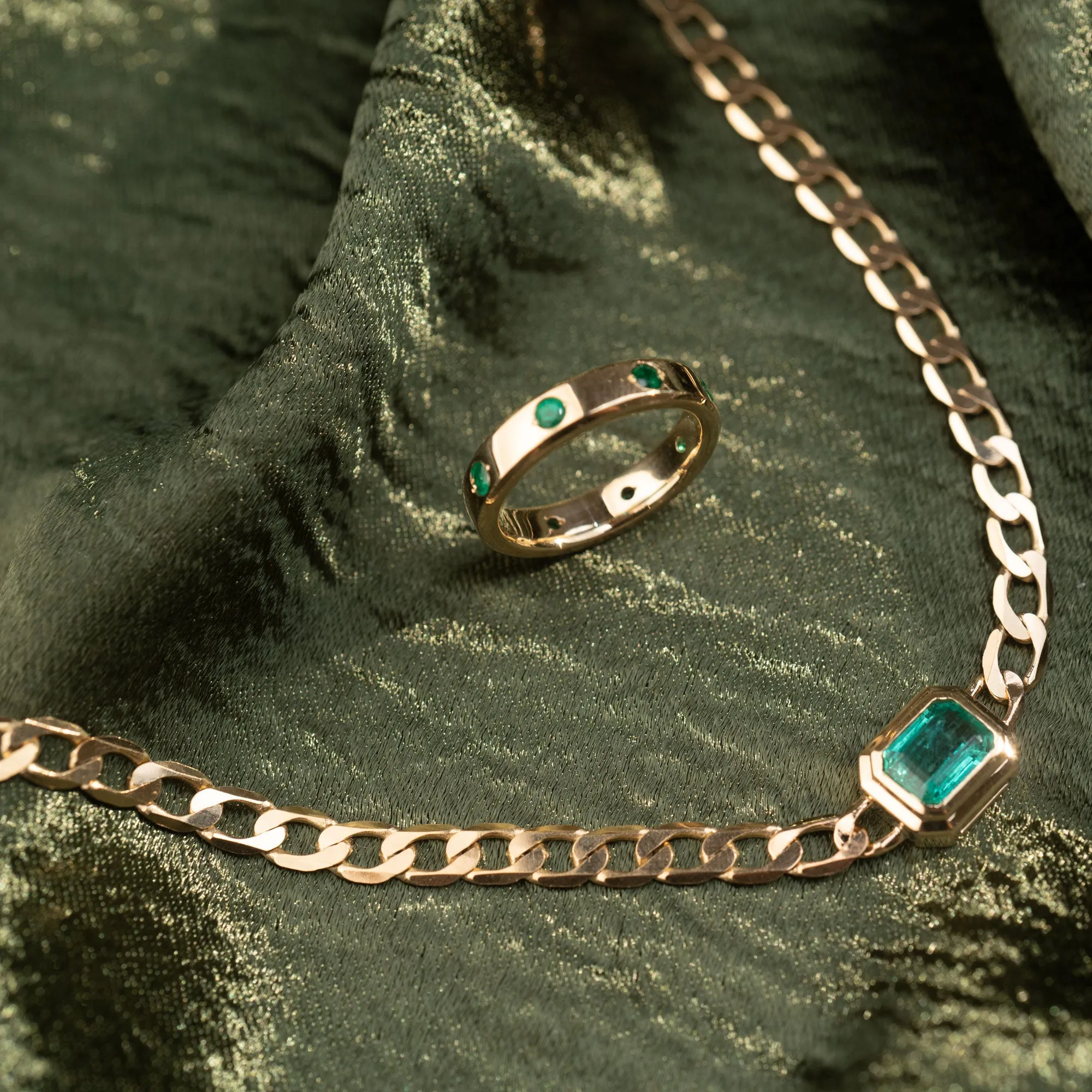 14k Gypsy Set Emerald Eternity Band