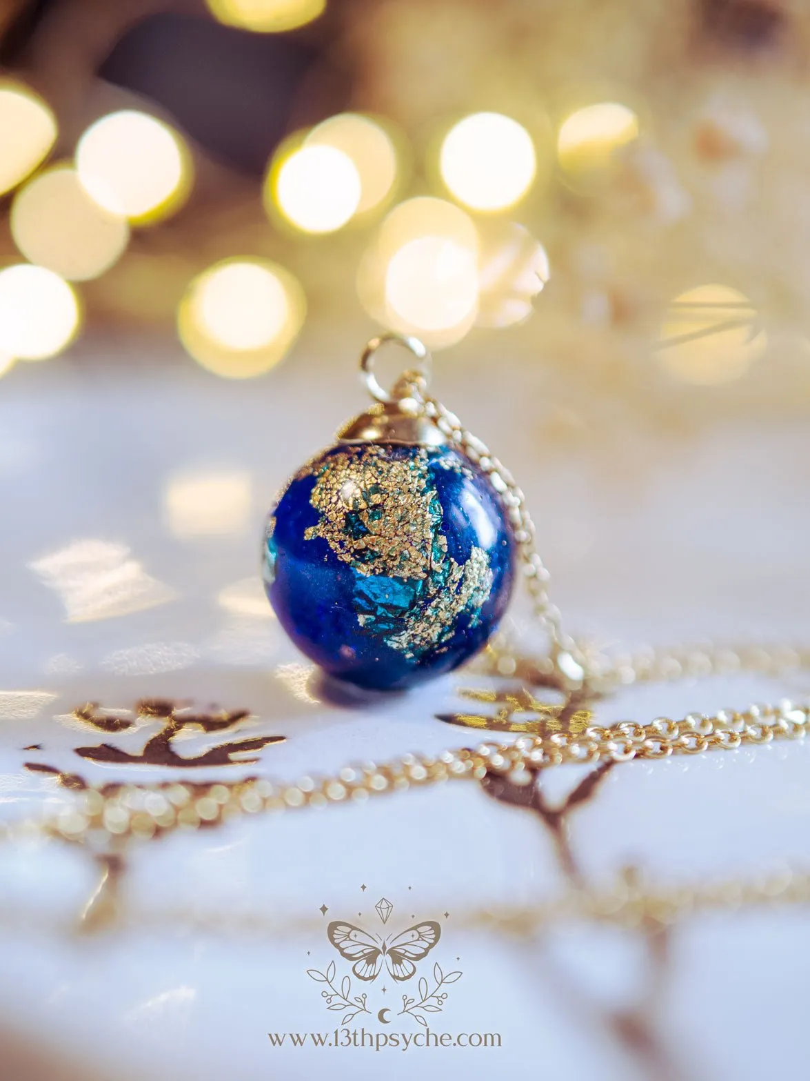 Blue planet, earth inspired resin ball necklace