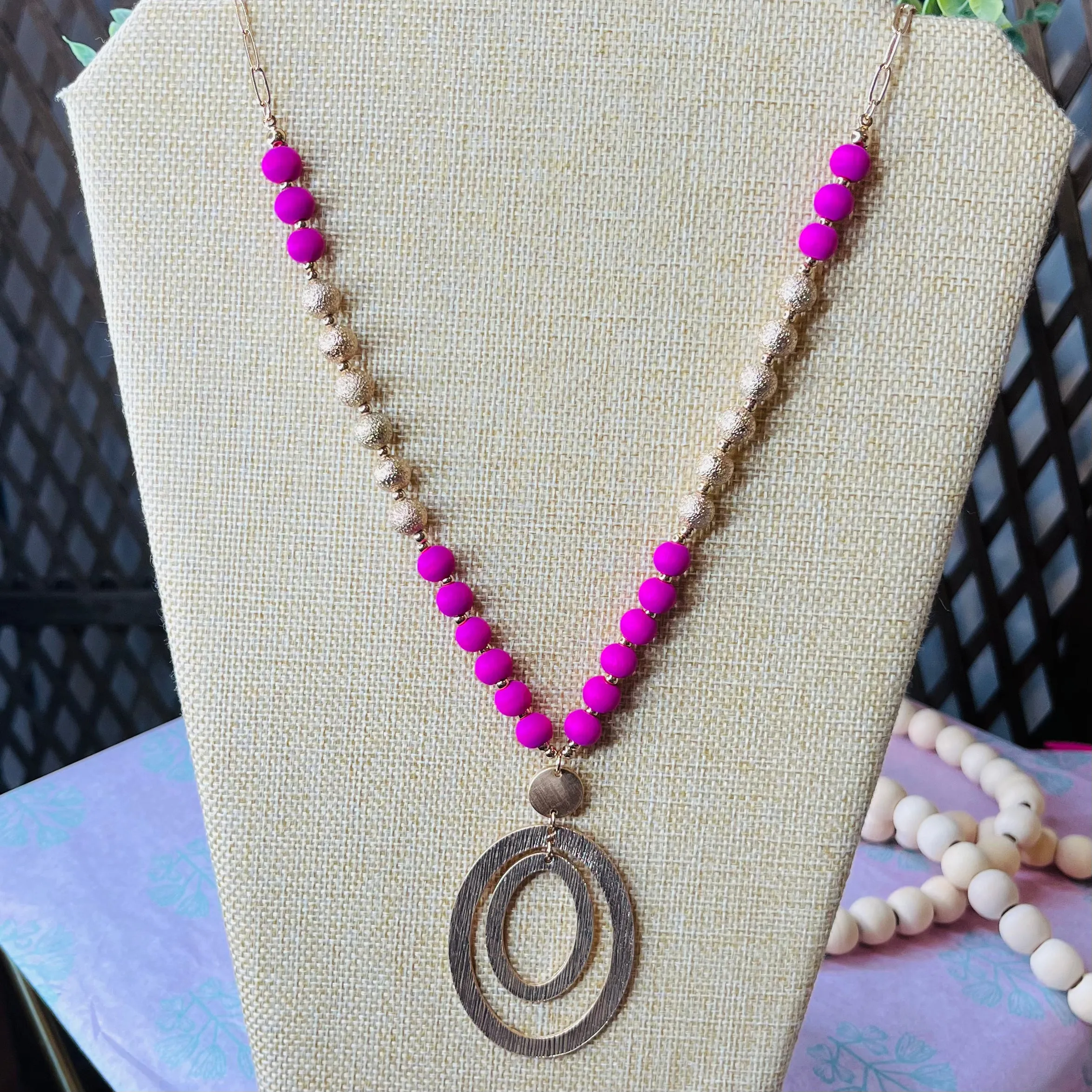 clay bead necklace with gold pendant: pink