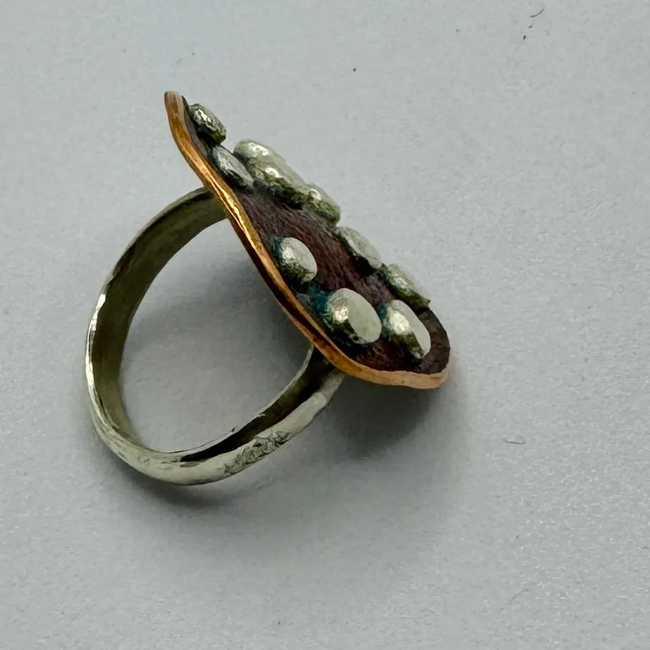 Copper disc ring with silver dots